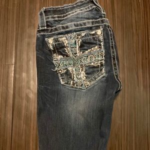 Size 25. Skinny Miss Me Jeans.